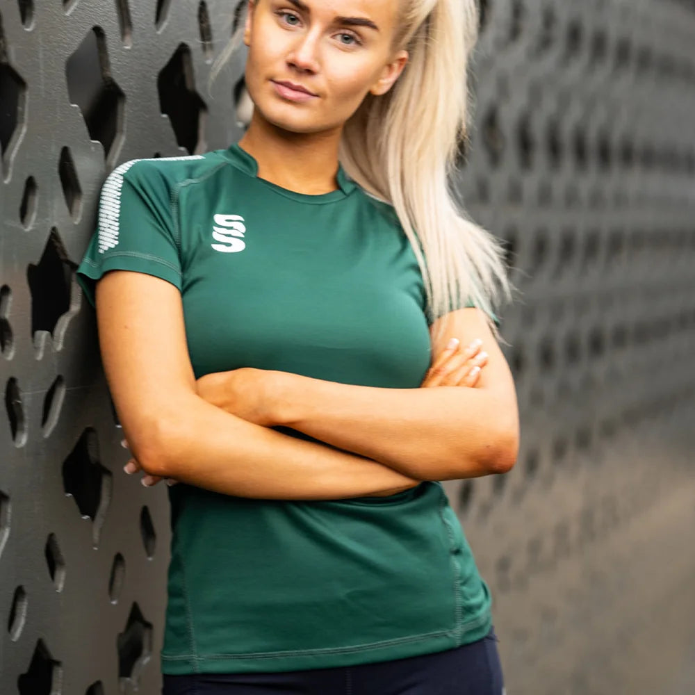 Model wearing Stuart Surridge Dual Games Shirt - Women's Fit - Bottle