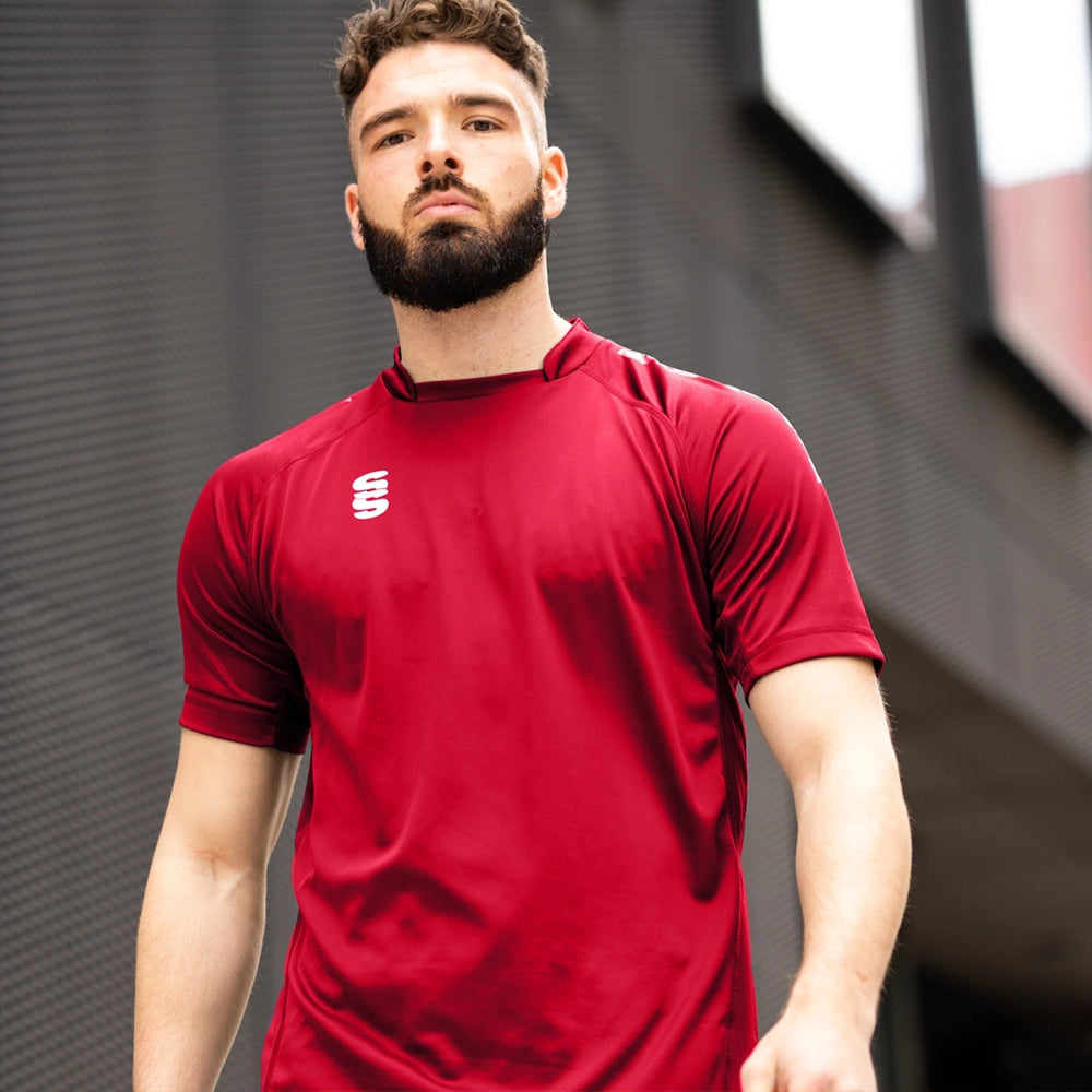Model wearing the Stuart Surridge Dual Games Shirt in Red