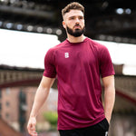 model wearing Stuart Surridge Dual Games Shirt - Maroon