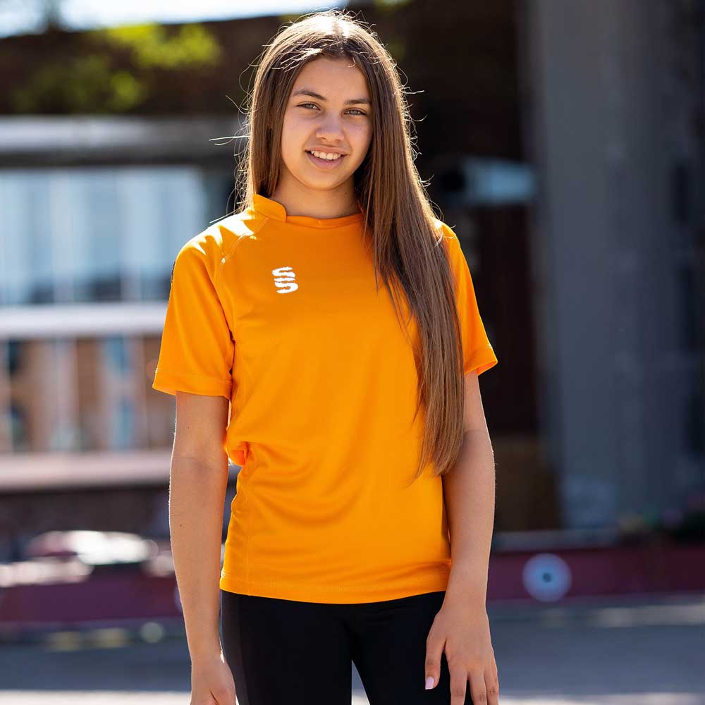model wearing Stuart Surridge Dual Games Shirt - Orange