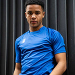 model wearing Stuart Surridge Dual Games Shirt - Royal