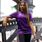 model wearing Stuart Surridge Dual Games Shirt - Women's Fit - Purple