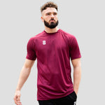 Model wearing Stuart Surridge Dual Games Shirt - Maroon