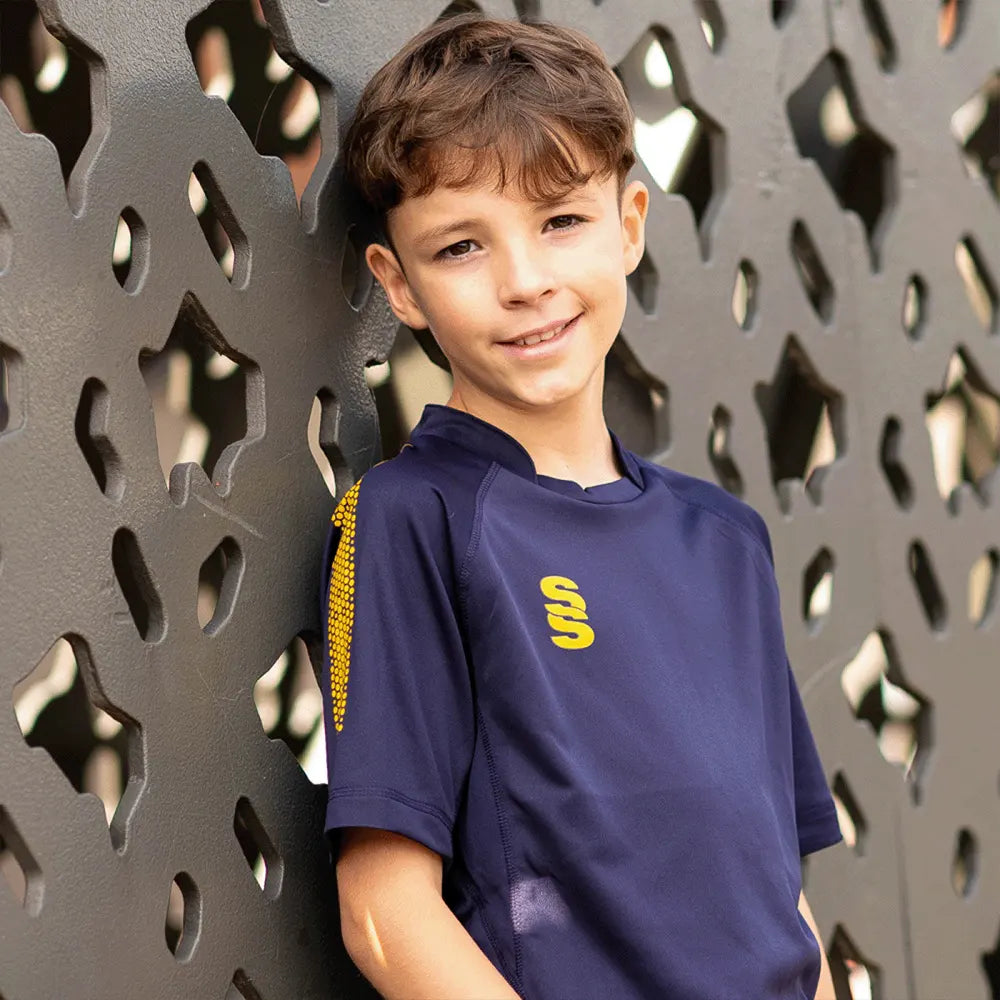 Junior Model wearing Stuart Surridge Dual Games Shirt - Navy