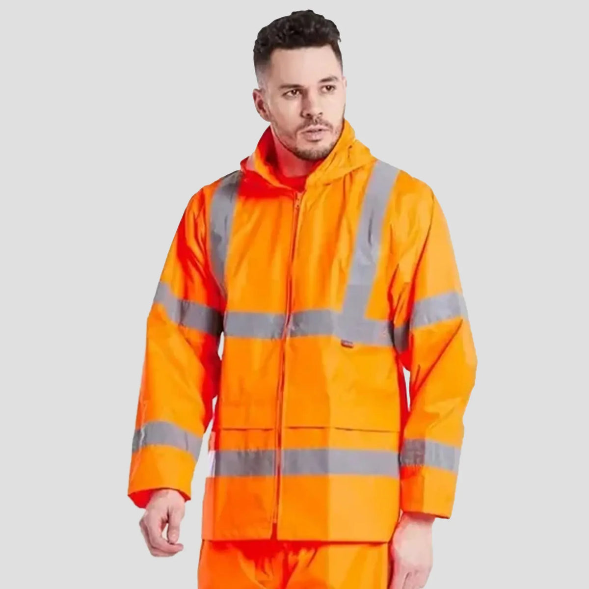 Model wearing the Portwest Hi-Vis Rain Jacket H440 in Orange.
