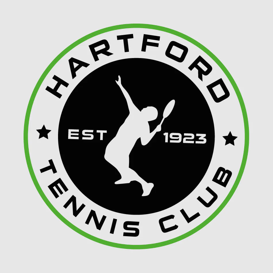 Hartford Tennis Club logo, circular black and white design with green border featuring a tennis player silhouette serving and the text established 1923, representing the official branding for Hartford Tennis Club in Cheshire, with teamwear and merchandise supplied by Buccaneer Group through their official club shop.