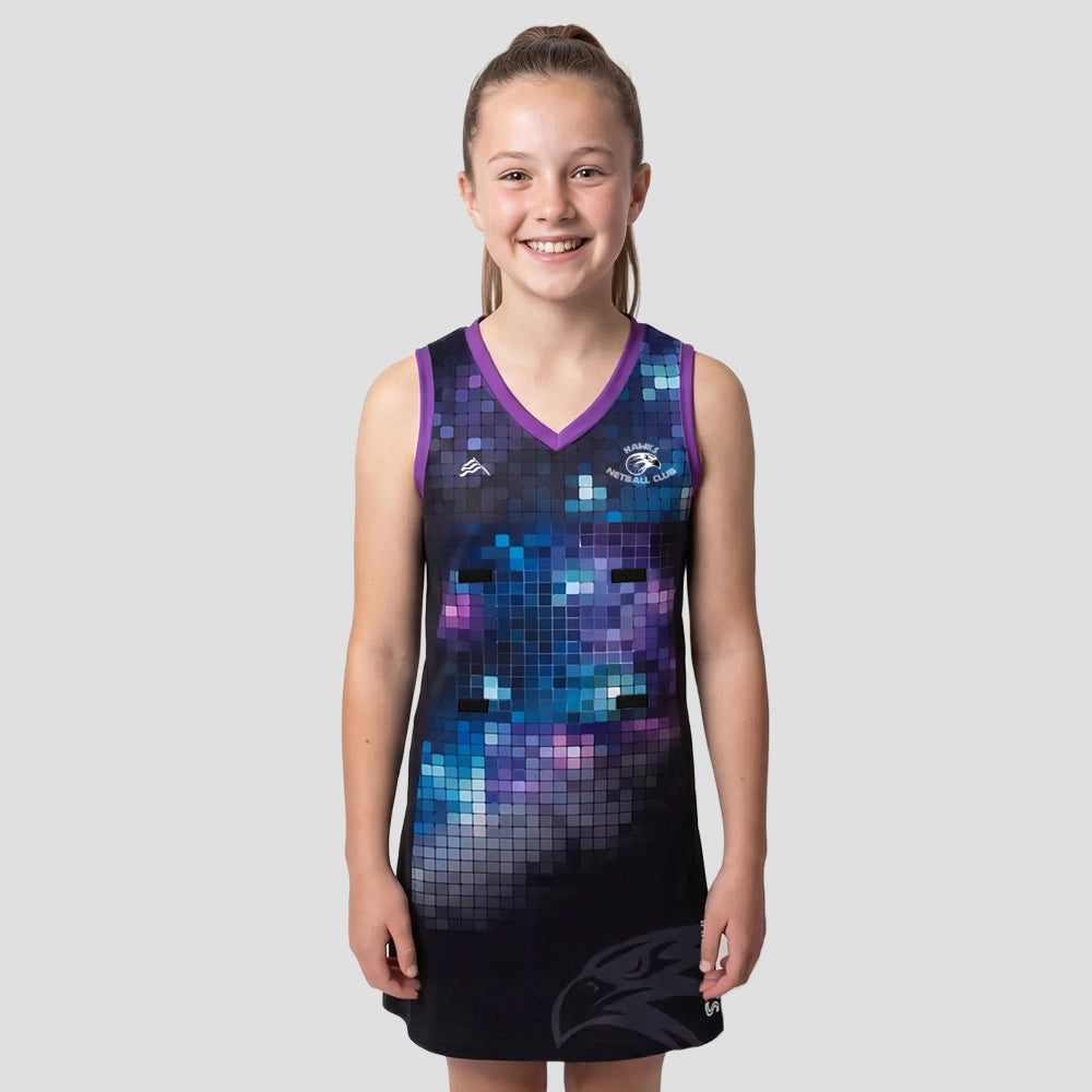 Model wearing the Hawks Netball Dress - Junior