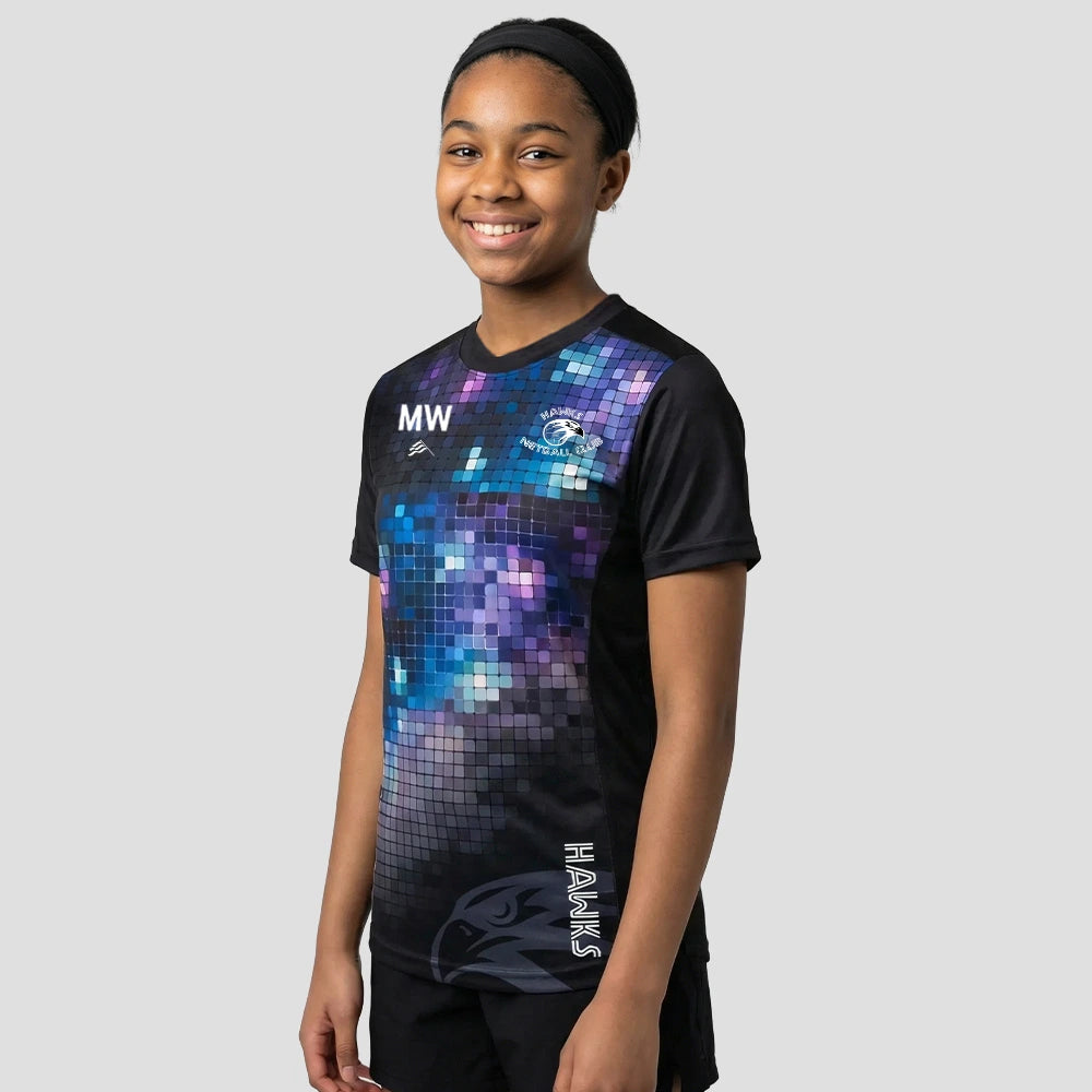 Model wearing the Hawks Netball Club Technical Tee – Junior