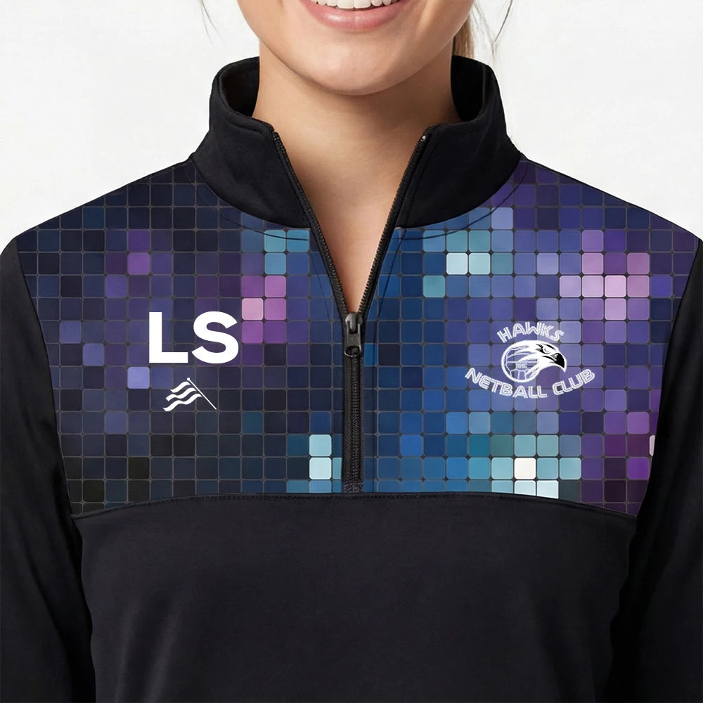 Close-up shot of model wearing the Hawks Netball Club 1/4 Zip Top – Adult