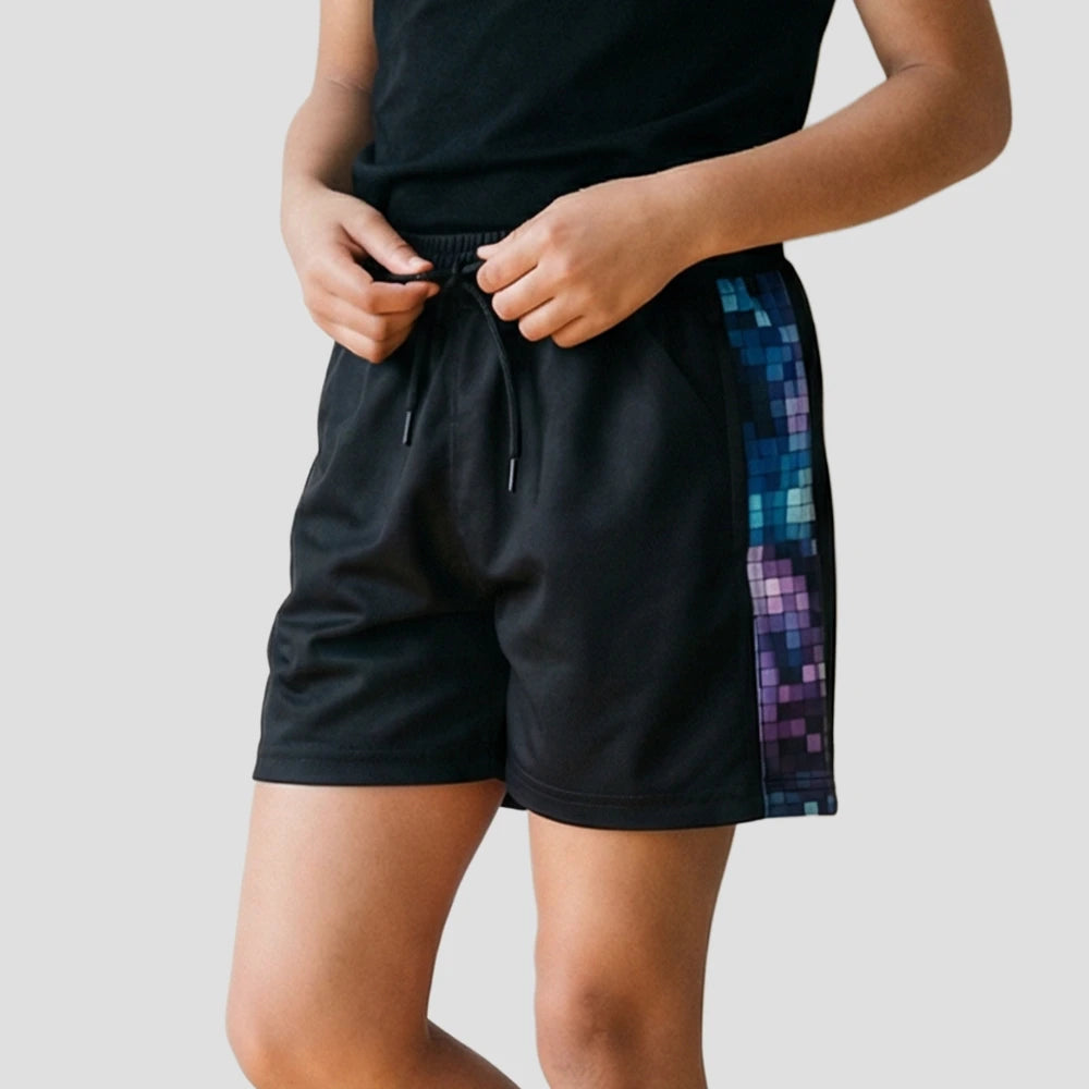 Model wearing the Hawks Netball Club Training Shorts – Juniors