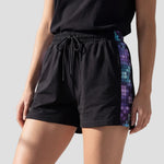 Model wearing the Hawks Netball Club Training Shorts – Womens
