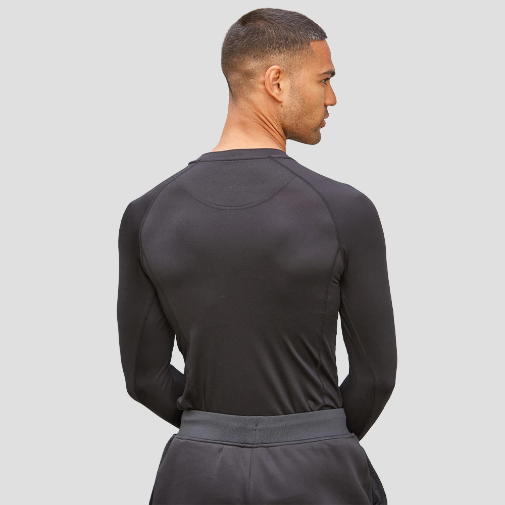 Rear view of Male Model wearing the Hawks Netball Club Baselayer – Adult