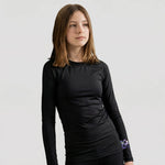 Model wearing the Hawks Netball Club Baselayer – Junior