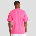 Rear view of Model wearing the AWDis Cool T-Shirt JC001 in Electric Pink