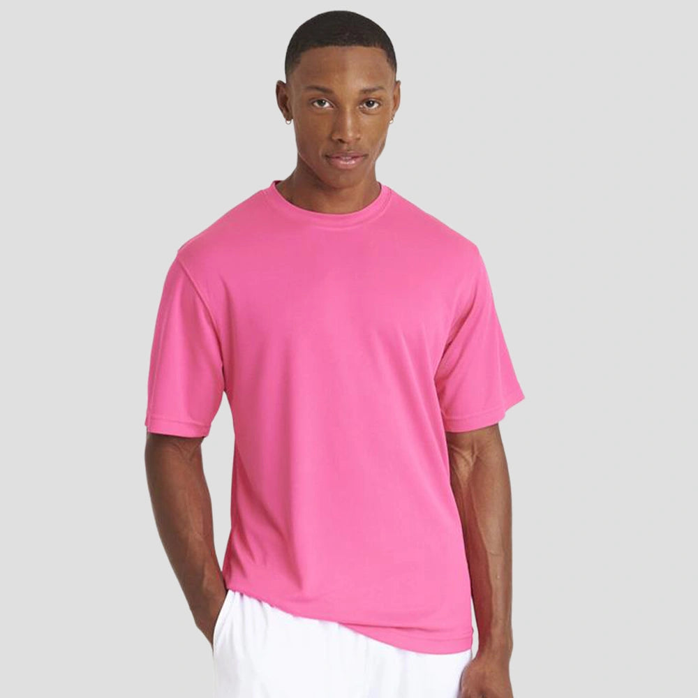 Model wearing the AWDis Cool T-Shirt JC001 in Electric Pink