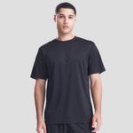 Model wearing the AWDis Cool T-Shirt JC001 in Jet Black