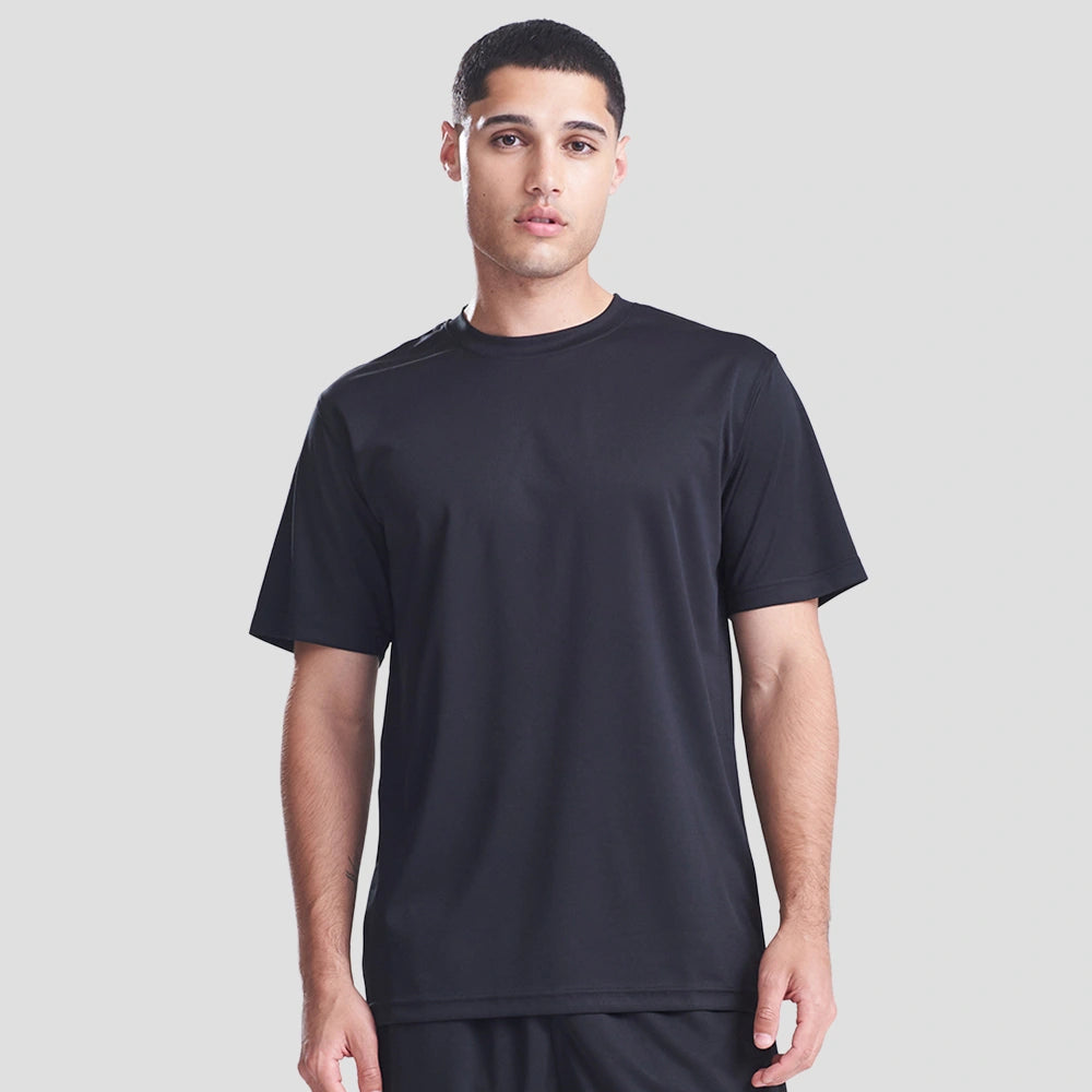 Model wearing the AWDis Cool T-Shirt JC001 in Jet Black