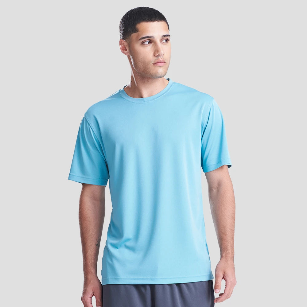 Model wearing the AWDis Cool T-Shirt JC001 in Blue