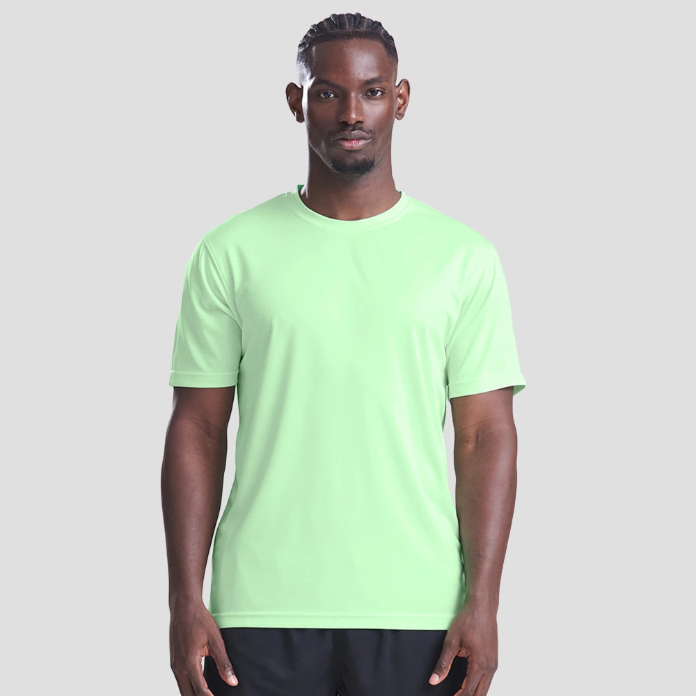 Model wearing the AWDis Cool T-Shirt JC001 in Green