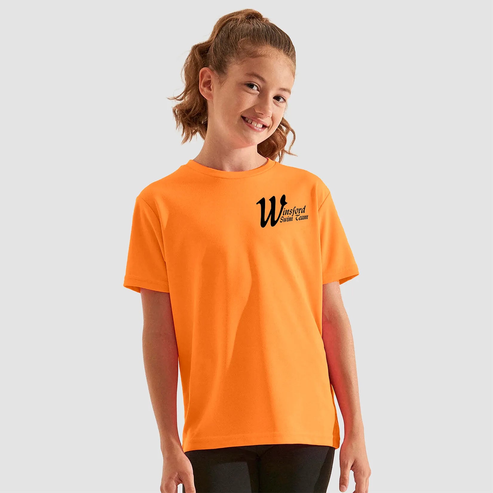 Model wearing the Winsford ASC Team T-Shirt – Junior (Orange)