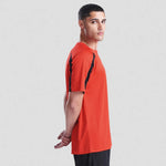 side view of model wearing AWDis Cool Contrast Wicking T-Shirt