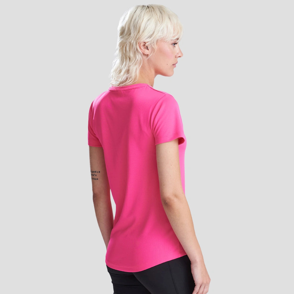 Rear view of Model wearing the AWDis Ladies Cool T-Shirt JC005 in Hyper Pink