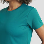 Close-up of Model wearing the AWDis Ladies Cool T-Shirt JC005 in Jade Green