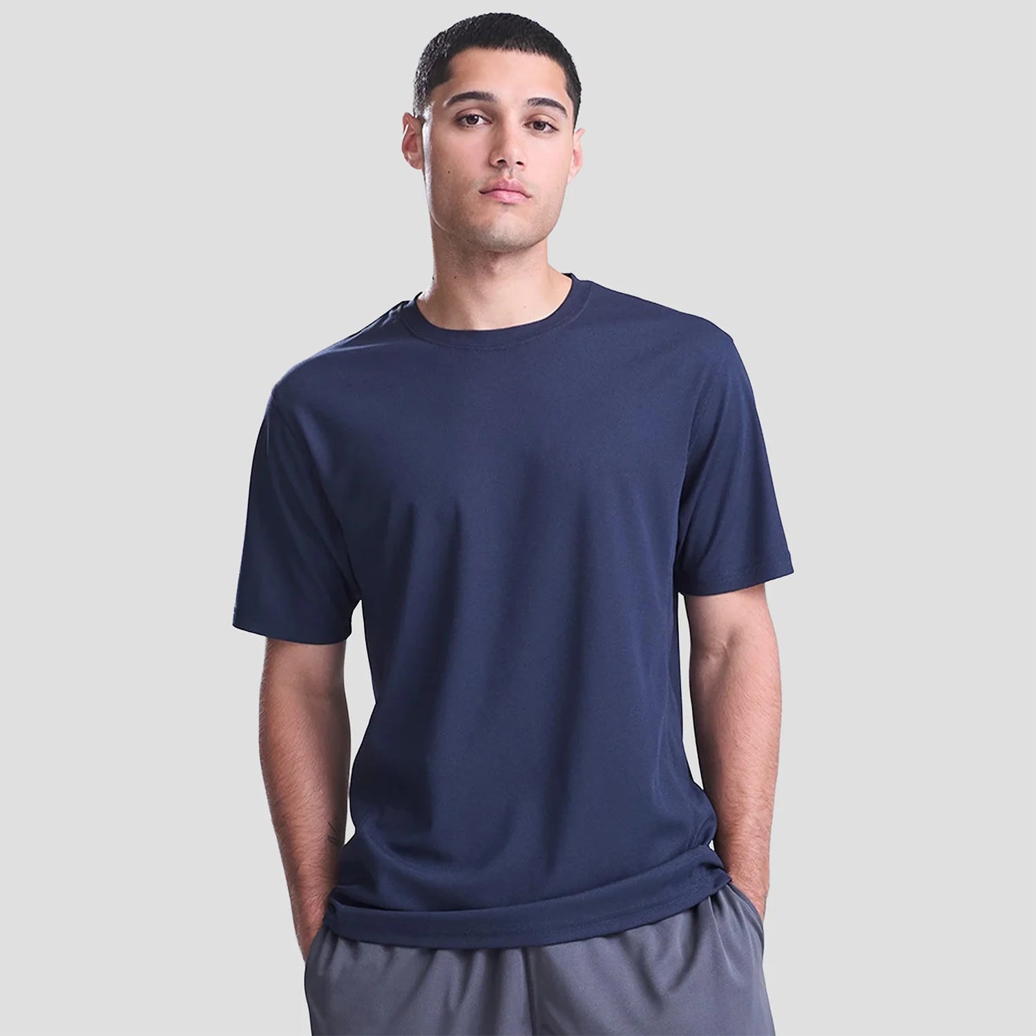 Model wearing the AWDis SuperCool Performance T-Shirt JC011