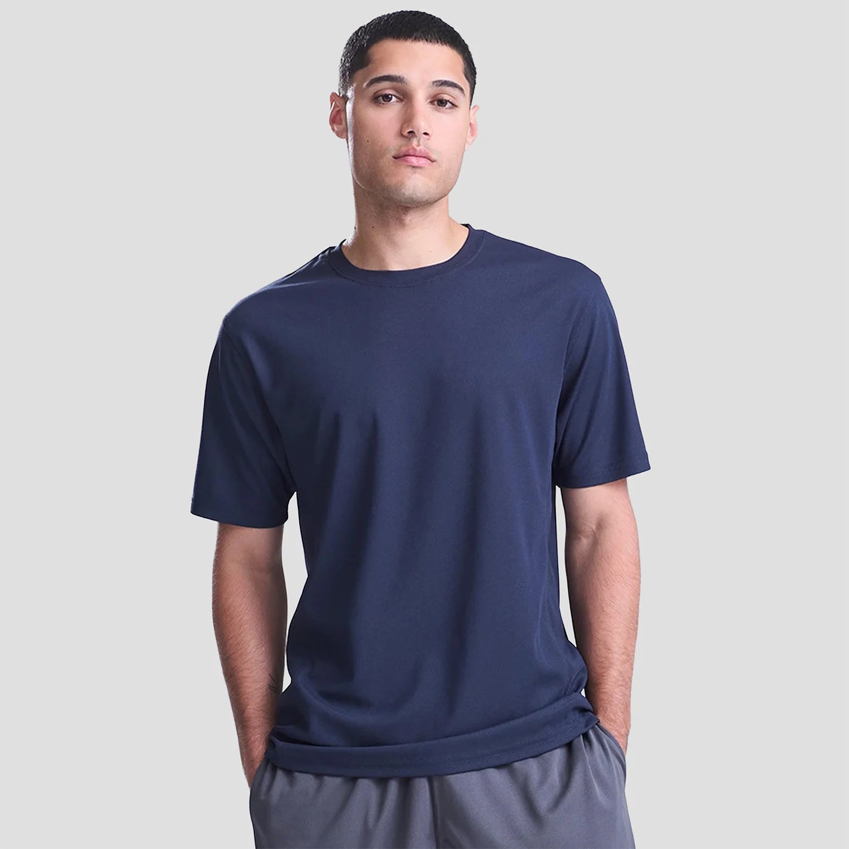 Model wearing the AWDis SuperCool Performance T-Shirt JC011