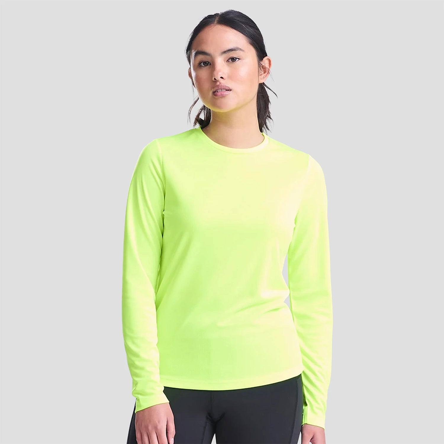 Model wearing the Ladies Cool Long Sleeve T-Shirt JC012 in Electric Yellow
