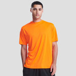 Model wearing the JC020 AWDis Cool Smooth T-Shirt in Electric Orange