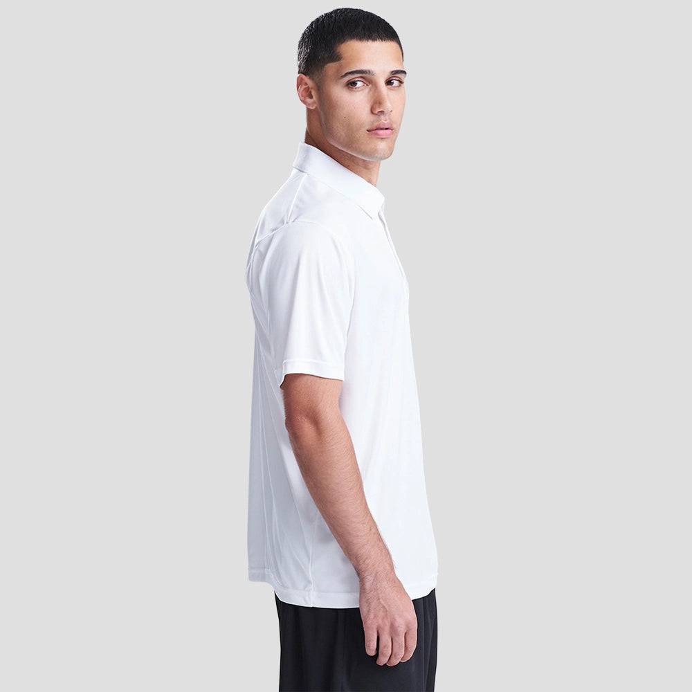 Side view of Model wearing the AWDis Cool Smooth Polo Shirt JC021 in Arctic White
