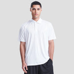 Model wearing the AWDis Cool Smooth Polo Shirt JC021 in Arctic White