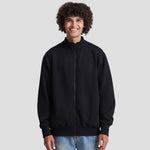 Model wearing the JH147 AWDis Campus Full Zip Sweatshirt in Deep Black