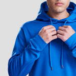 Close-up of model wearing the JH006 AWDis Sports Polyester Hoodie in Royal Blue