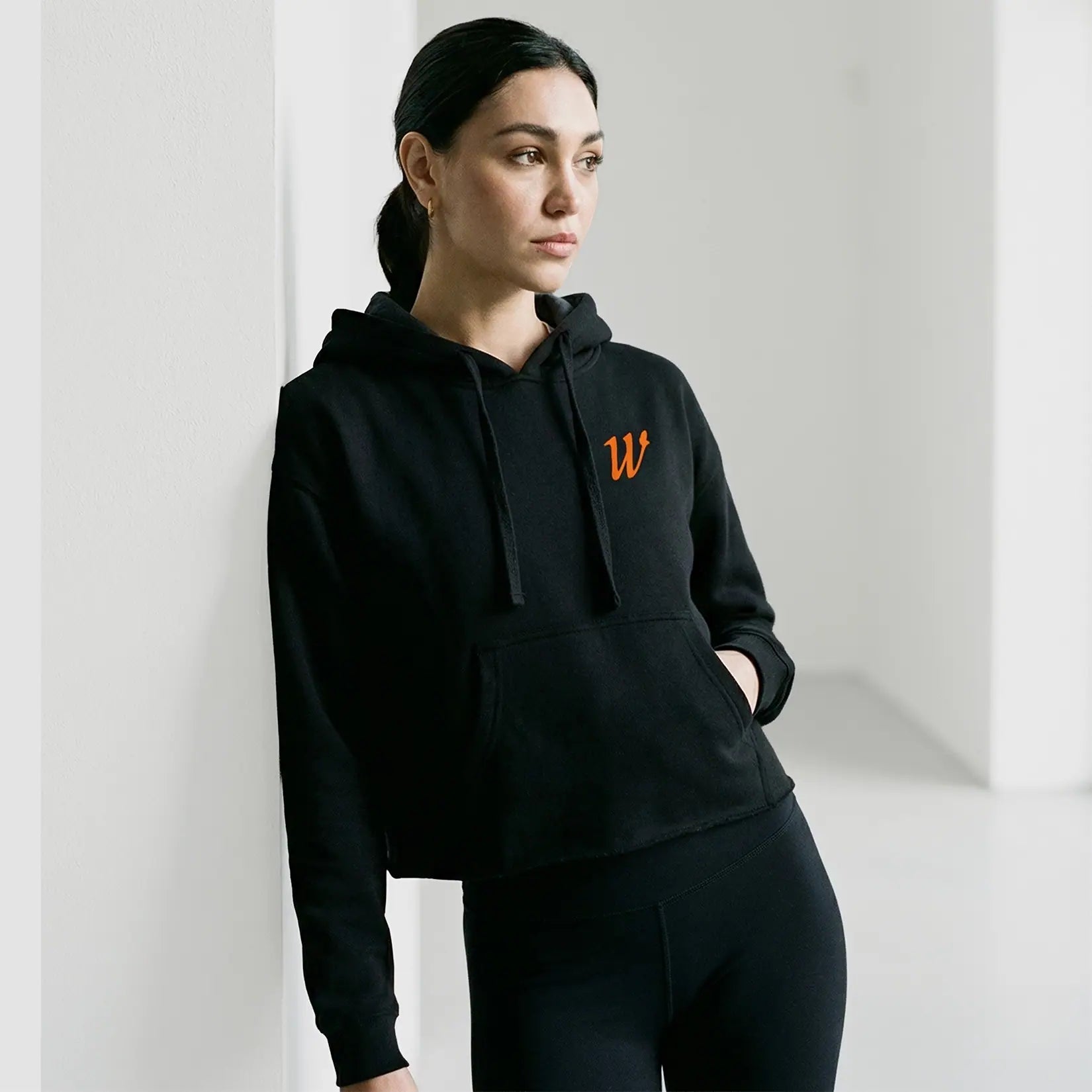 Model wearing the Winsford ASC Cropped Hoodie – Ladies JH016