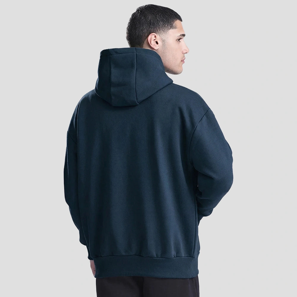 Rear view of Model wearing the JH120 AWDis Heavyweight Signature Hoodie in New French Navy