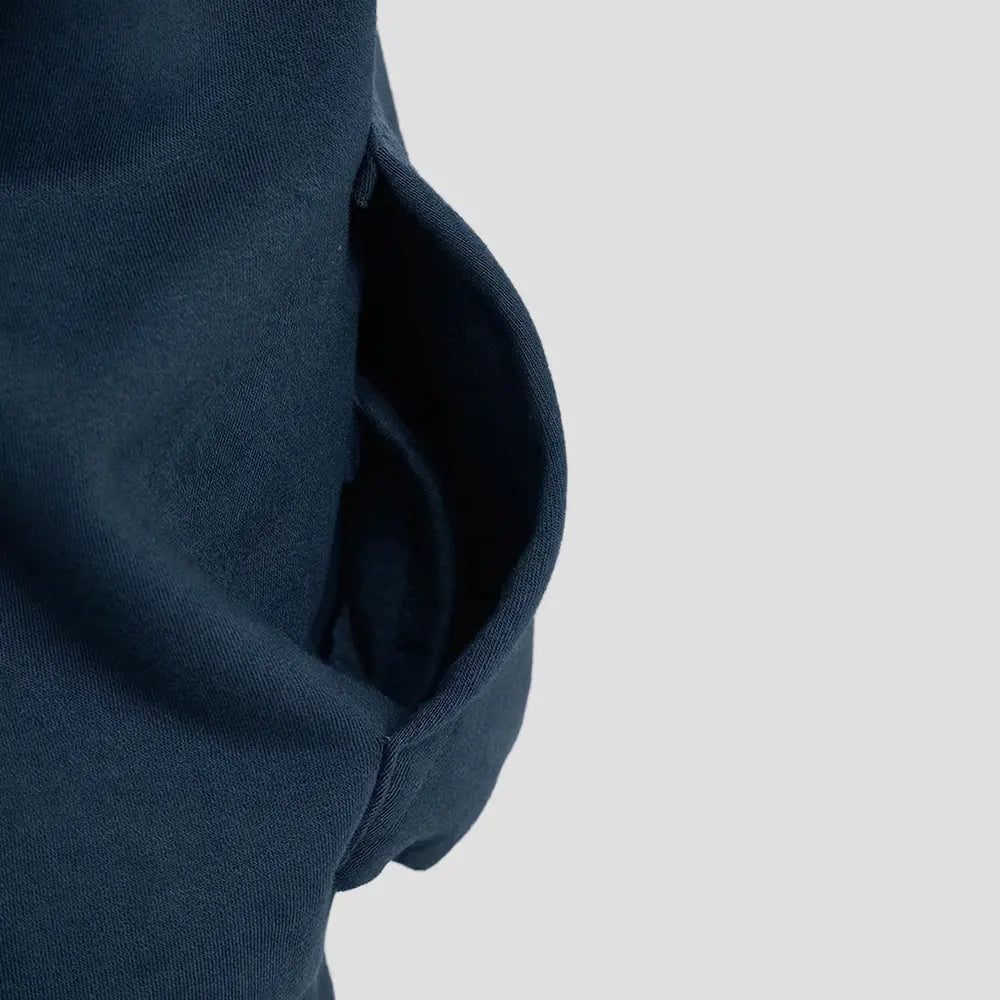 Close-up of the JH120 AWDis Heavyweight Signature Hoodie in New French Navy pocket