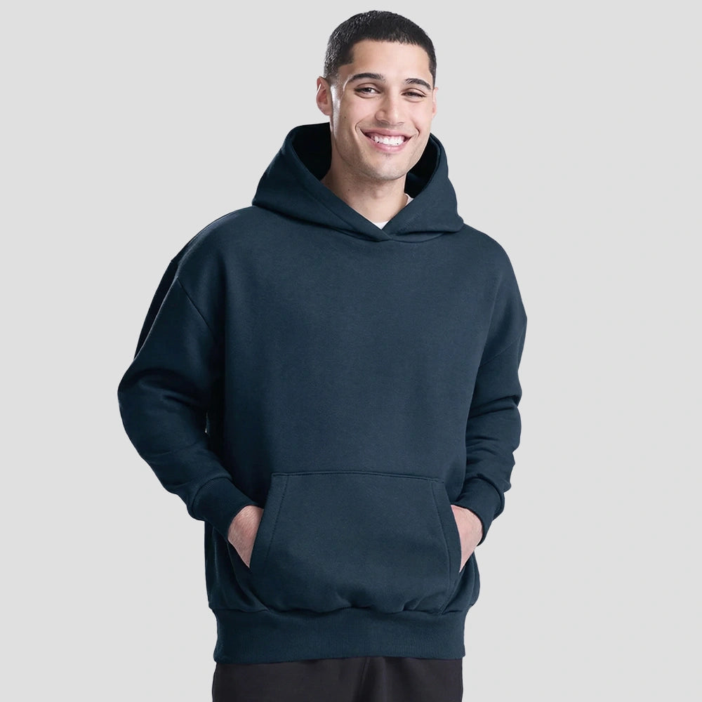 Model wearing the JH120 AWDis Heavyweight Signature Hoodie in New French Navy