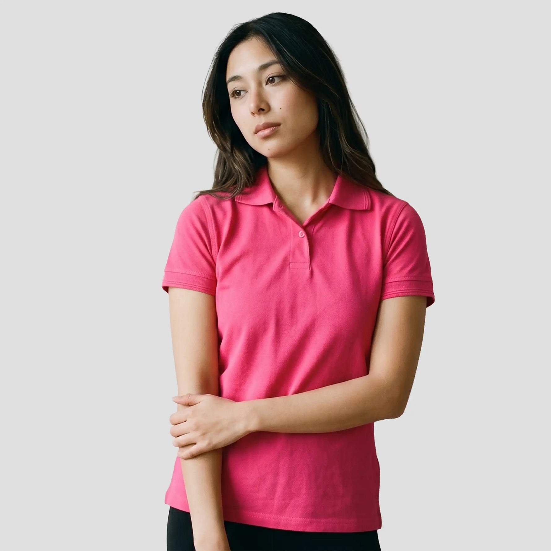 Model wearing the Ladies Eagle Polo Shirt 1160 in Pink