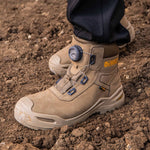 model wearing stone Lander Work Boots