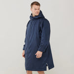 Model wearing the Finden Hales Unisex All-Weather Robe in Navy.