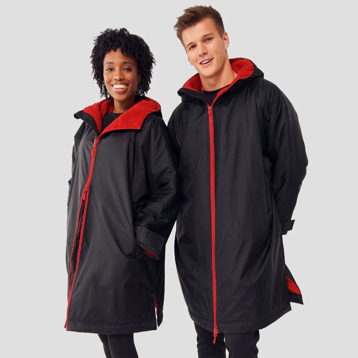 2 models wearing the Finden Hales Unisex All-Weather Robe in Black/Red.