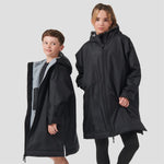 Two models wearing the Finden Hales Kids All-Weather Robe in black.