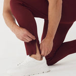 model crouched down wearing Knitted Tracksuit Pants 