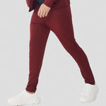 model wearing Knitted Tracksuit Pants in burgundy