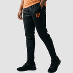 Model wearing the Winsford ASC Skinny Pants – Adult