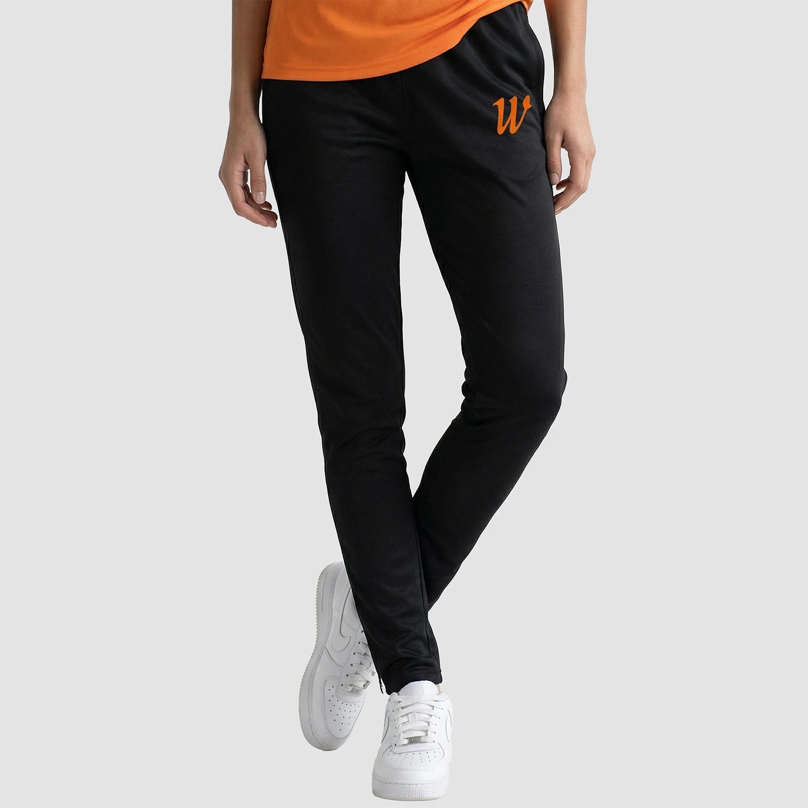 Model wearing the Winsford ASC Skinny Pants – Adult