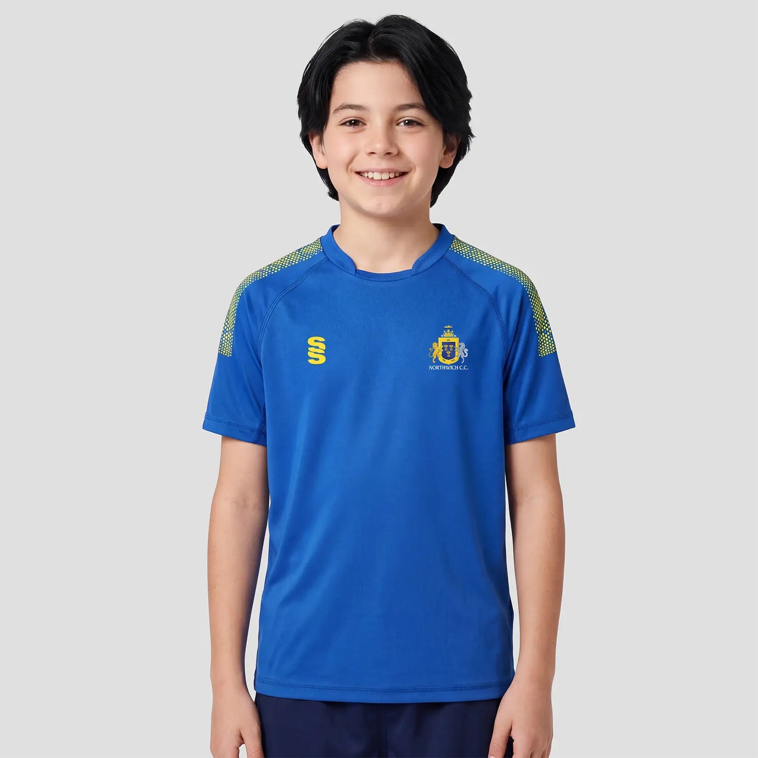 Model wearing the Northwich Cricket Club Playing Shirt - Junior