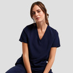 Model wearing the Onna by Premier Ladies Invincible Onna-Stretch Tunic in Navy
